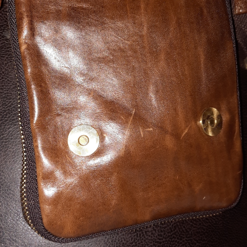Leather mini messenger bag.